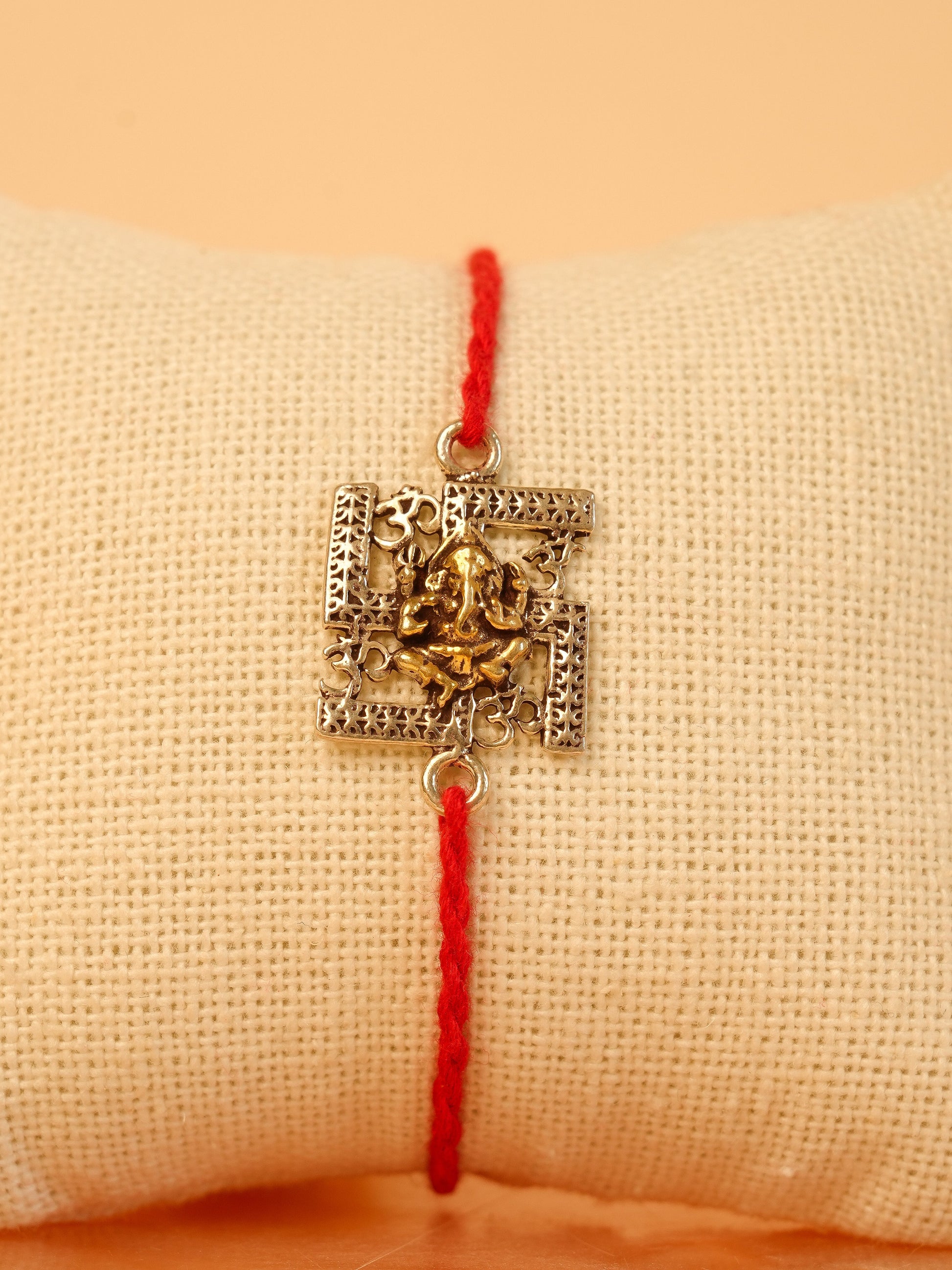 Om Swastika Ganesha Charm Rakhi