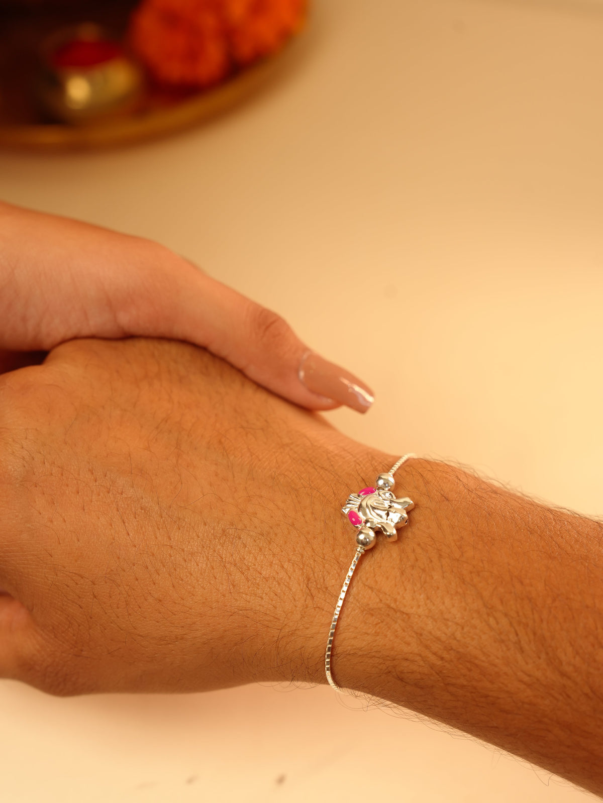 Silver Ganesha Chain Bracelet Rakhi - Pink Accent