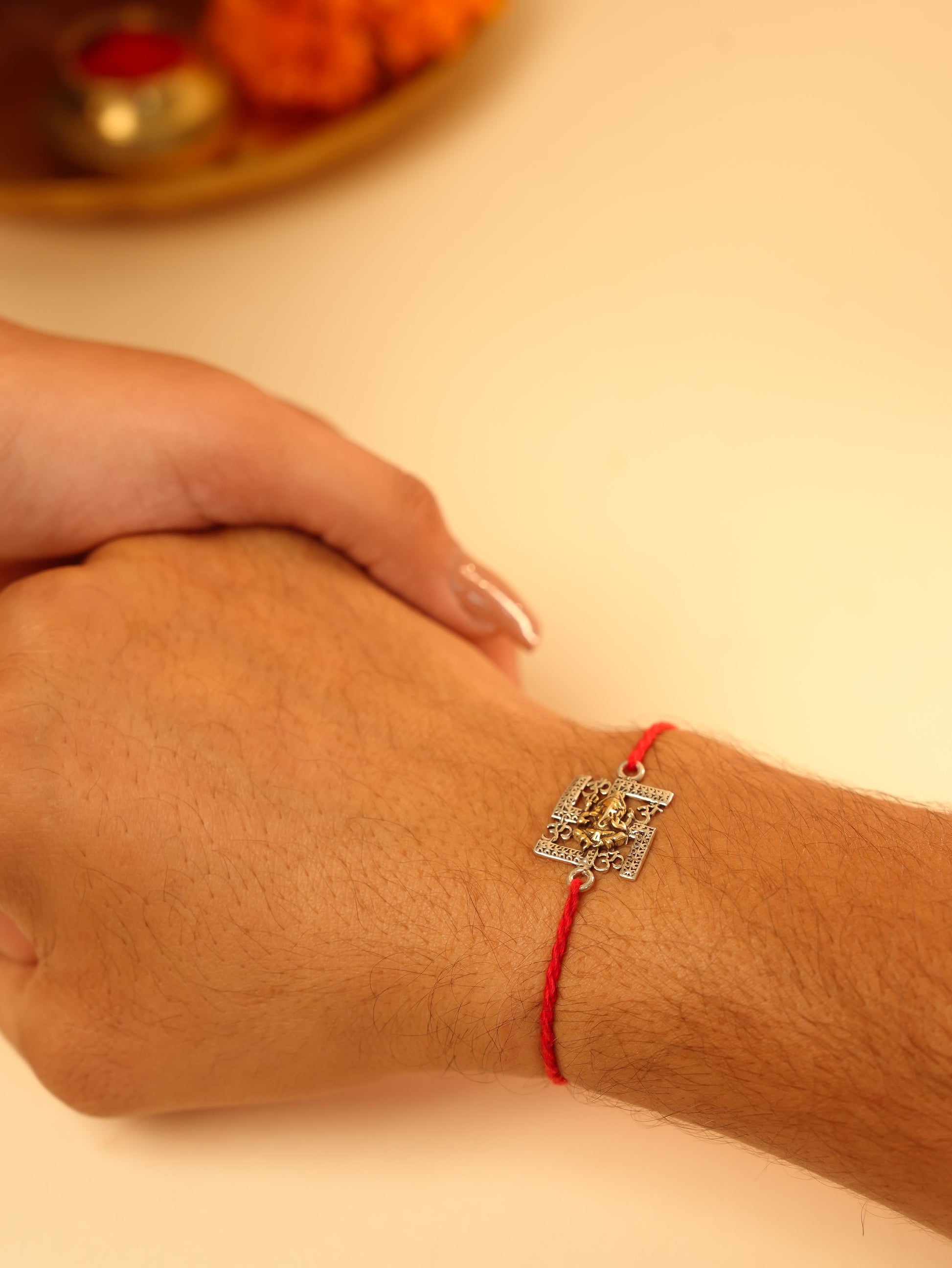 Om Swastika Ganesha Charm Rakhi